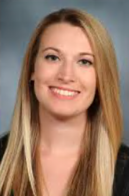 a woman smiling for a portrait