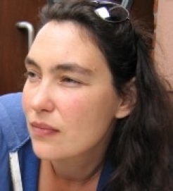 a woman smiling for a portrait