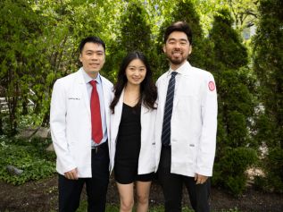 a group of physician assistant graduates posing for a photo