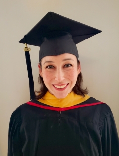 a woman smiling for a portrait