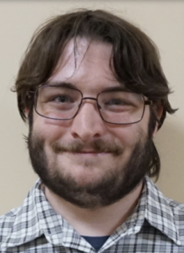 A man posing for a photo