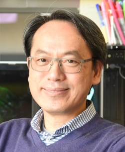 A man posing for a photo