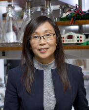 a woman in a lab posing for a picture