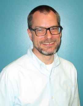 A man posing for a photo