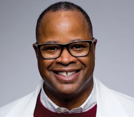 A man smiling for a photo