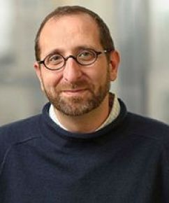 A man posing for a photo
