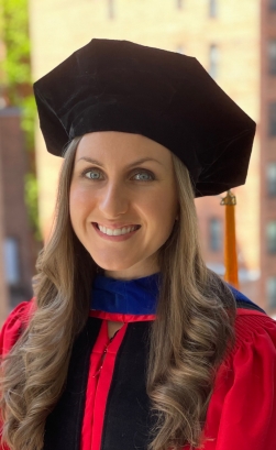 a woman smiling for a portrait