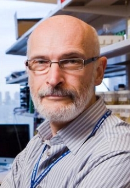 A man posing for a photo