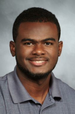 A man posing for a photo
