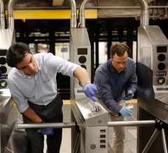 Chris Mason and a colleague swab New York City turnstiles for microbes