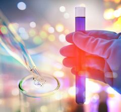 a hand holding a test tube in an illustration of discovery